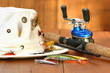 Photo: Fishing reel with hat and color lures Fishing reel with hat and color lures