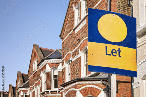 Photo: A typical red-brick townhouse with " Let" sign , London. A typical red-brick townhouse with " Let" sign , London.