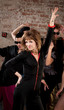 Pretty lady dancing at a 1970s Disco Music Party