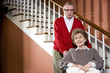 Senior couple at home, woman in wheelchair