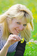 Foto: Young woman with flower Young woman with flower