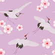 Seamless pattern with cranes and cherry flowers