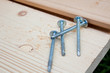 four screws on wood plank four screws on wood plank