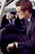 Photo: young businessman in his car young businessman in his car