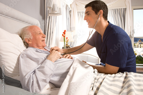 Photo: Checking the lungs with stethoscope Checking the lungs with stethoscope