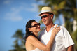 Foto: Happy senior couple enjoying vacation at tropical resort Happy senior couple enjoying vacation at tropical resort