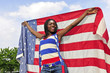 Foto: Fussballfan mit amerikanischer Flagge am Fussballplatz Fussballfan mit amerikanischer Flagge am Fussballplatz