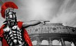 Legionary soldier in front of coliseum