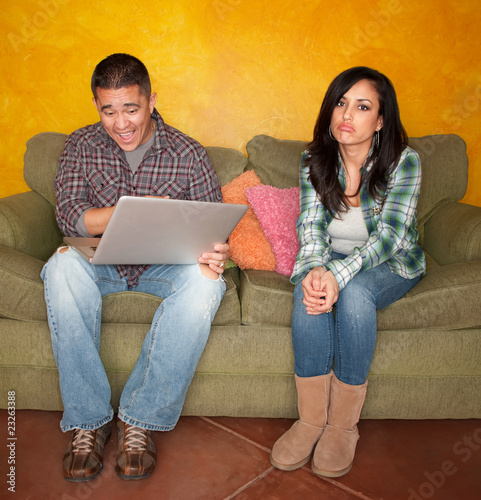 Photo: Hispanic Couple with Computer Hispanic Couple with Computer