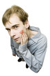 Young man with kiss trace on his cheek