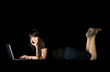 Pretty woman with laptop and phone