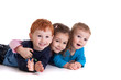 Three happy kids on floor together Three happy kids on floor together