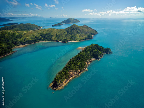 Photo: Aerial view of the lush Whitsunday Islands Aerial view of the lush Whitsunday Islands