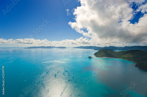 Photo: Aerial view of the Whitsunday Islands and brilliant ocean Aerial view of the Whitsunday Islands and brilliant ocean