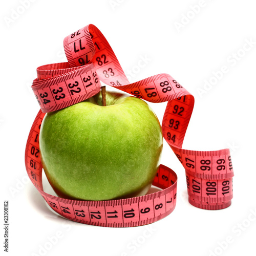 Photo: measuring ribbon and apple for diet measuring ribbon and apple for diet