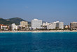 Beach of Mediterranean Sea and the hotels of Cala Millor resort,