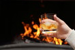 Whiskey by the fireplace