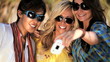 Girls laughing & posing with camera