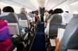 Interior of airplane with people inside