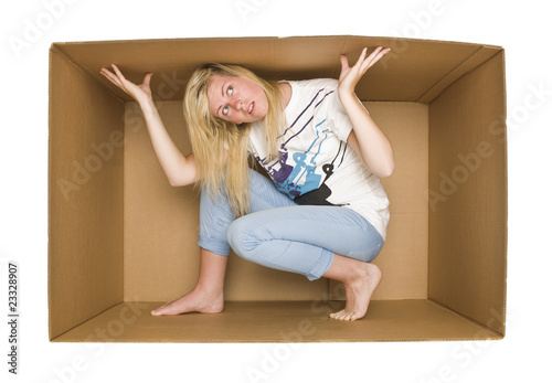 Photo: Woman inside a Cardboardbox Woman inside a Cardboardbox