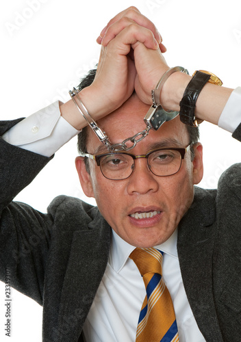 Foto: Manager mit Handschellen Manager mit Handschellen