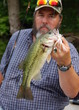 fisherman with bass
