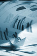Business concept, paper boat and tsunami documents