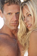Sexy Attractive Man and Woman Couple At the Beach