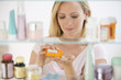 Foto: Woman Getting Medicine Woman Getting Medicine