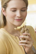 Woman Smelling Ginseng