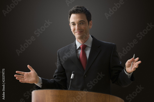 Photo: Businessman Giving a Lecture Businessman Giving a Lecture