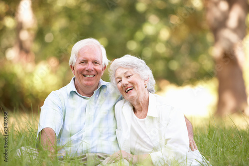 Photo: Senior Couple Sitting In Park Senior Couple Sitting In Park