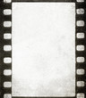Old grunge filmstrip - background with space for text Old grunge filmstrip - background with space for text