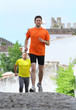 Middle age man running on a city road