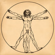 Vitruvian man on old paper background
