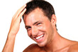 Closeup of a happy young man looking at camera