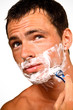 Sexy handsome young man with a shaving foam Sexy handsome young man with a shaving foam