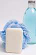 loofah and soap bottle
