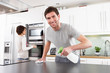 Photo: Young Couple Cleaning Cleaning Modern Kitchen Young Couple Cleaning Cleaning Modern Kitchen