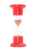 red sand-glass isolated on white.