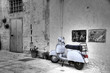 White scooter in corner alleyway. Monopoli. Apulia.
