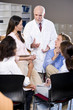 Photo: Professor having discussion with college students Professor having discussion with college students