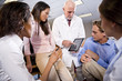 Photo: Professor having discussion with college students Professor having discussion with college students