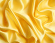 Smooth elegant golden silk can use as background Smooth elegant golden silk can use as background