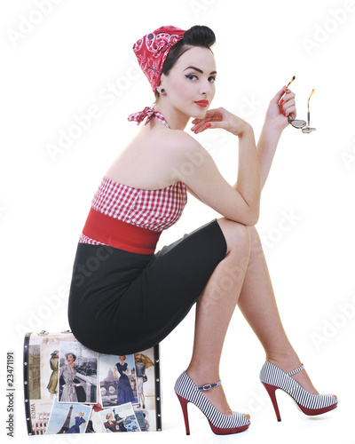 Photo: isolated woman with travel bag isolated woman with travel bag