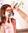 Child preschooler with face painting.
