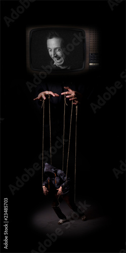 Photo: The media controls the marionette puppet The media controls the marionette puppet