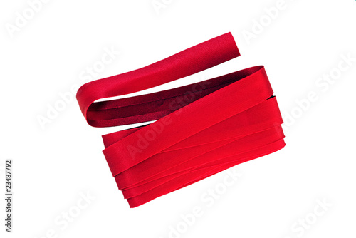 Photo: Red satin bias binding - isolated Red satin bias binding - isolated