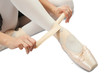 Photo: Ballerina putting on pointes Ballerina putting on pointes