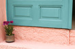 Bright turquoise green with pink wall in Greece